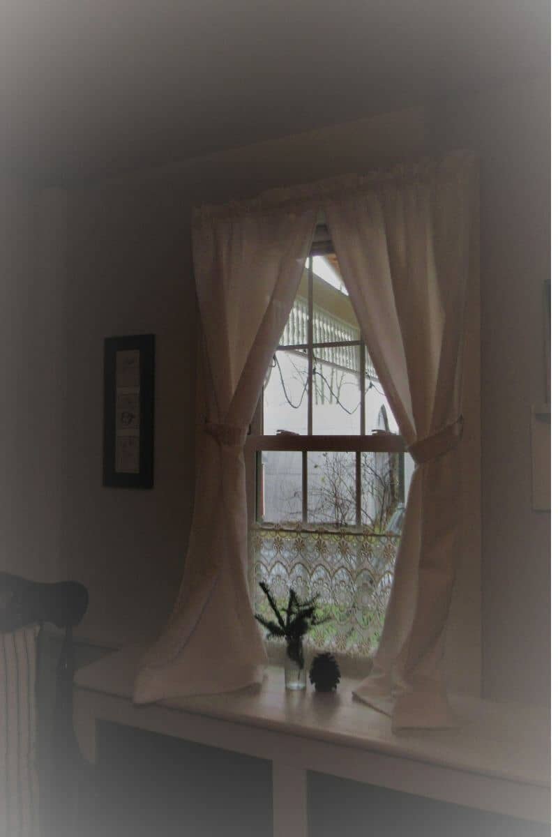 Window with white curtains in Master Bedroom
